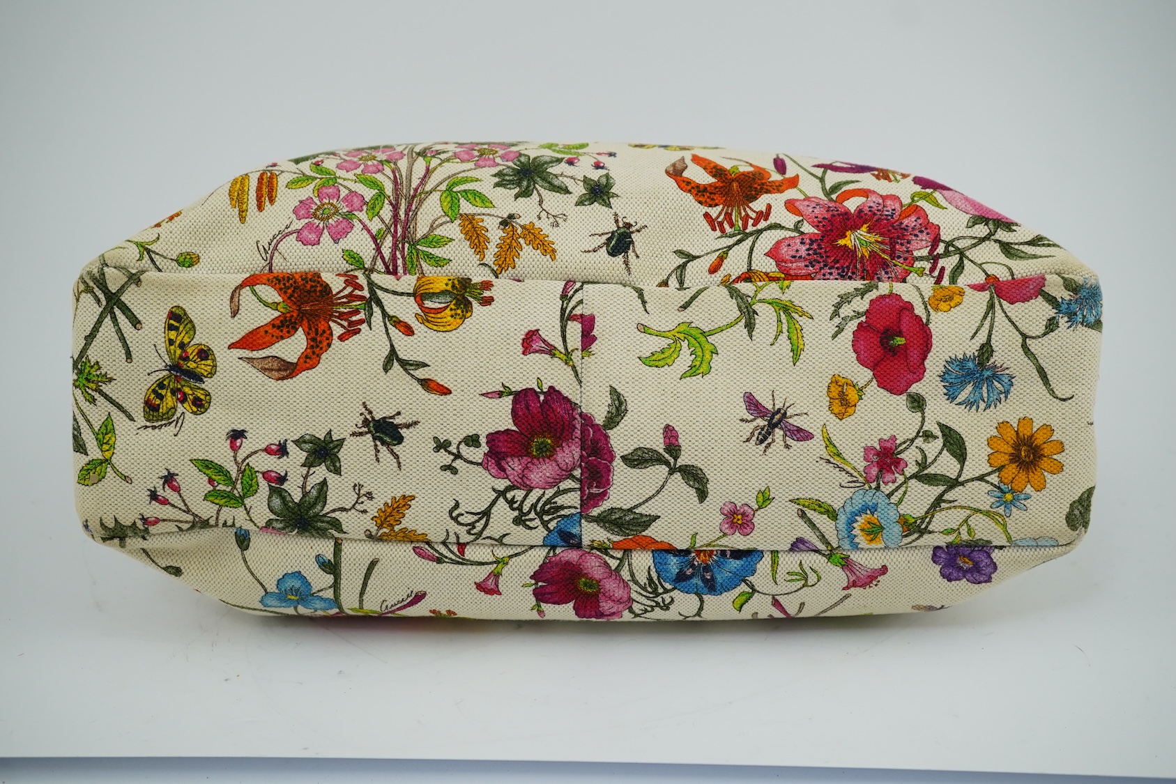 A Gucci flora canvas horse-bit hobo bag with dust bag